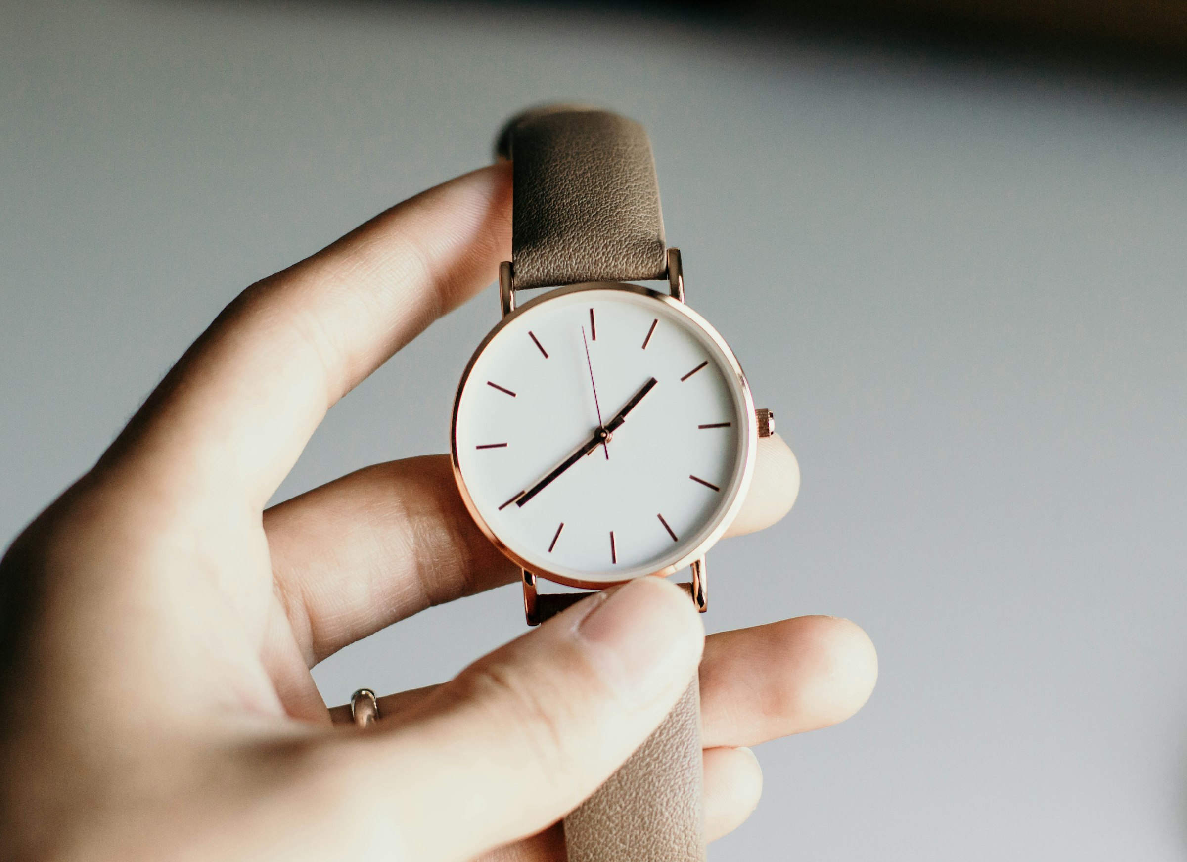 Close-up of a wristwatch on a wrist